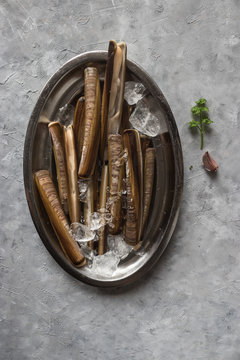 Plate with ice and razor clams