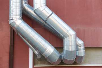 Air vent ducts of air conditioning and ventilation system on the wall