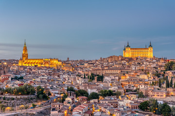 The old city of Toledo in Spain with the Cathedral and the Alcazar at dusk