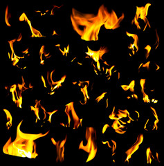 Set of fire flame isolated on a black background texture