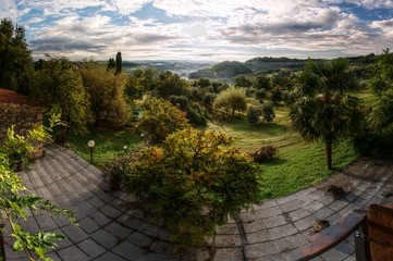 View across garden to Tuscan countryside near Florence