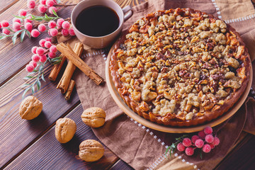 gingerbread tart with apples and nuts