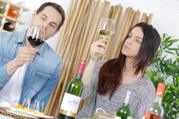 happy couple tasting good wine