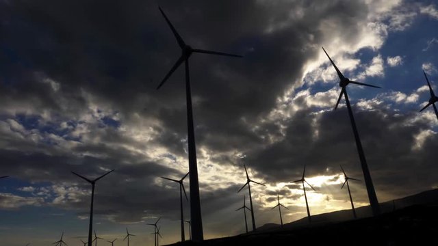 Wind generators in arinaga silouettes.