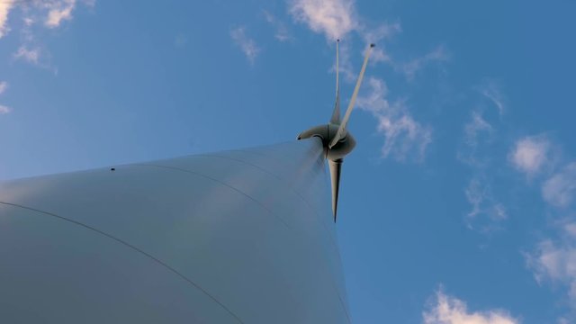 Vertical shot of wind generator from close up.