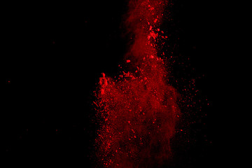 Abstract Red powder splatted background,Freeze motion of red powder exploding/throwing green dust.