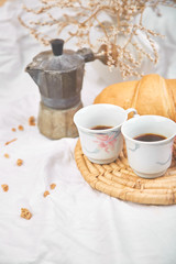 Good morning. Two cup of coffee with croissant and jam.