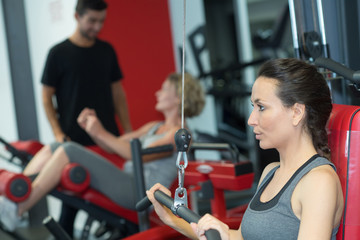 Fototapeta premium woman working out with bar