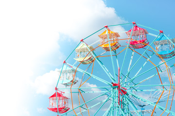 Ferris wheel on the background of blue sky,Colourful Vintage Ferris wheel