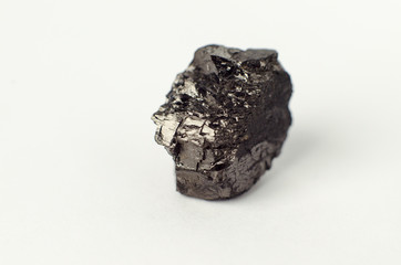 piece of anthracite coal isolated on white background