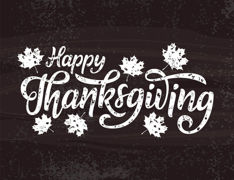 Happy Thanksgiving greeting. Hand drawn lettering on grey textured  background. EPS 10