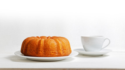 Homemade lemon cake in the form of a ring soaked with lemon syrup