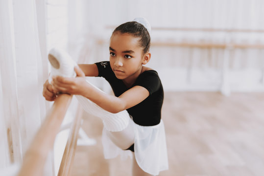 Ballet Training Of Young Girl In Balerina Tutu.