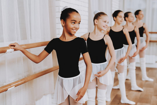 Ballet Training of Group of Young Girls Indoors.