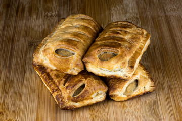 Sausage Rolls on a Wooden Surface