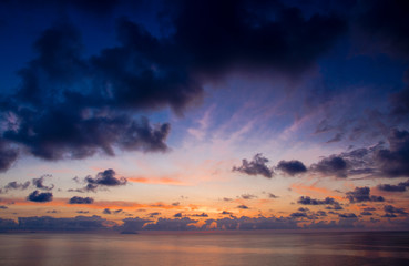 Obraz premium Aerial view of beautiful amazing sea sunset with color dramatic sky