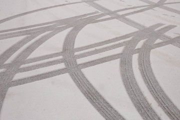 Traces of cars on freshly fallen snow