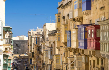 Narrow streets and yellow buildings in Valletta, Malta