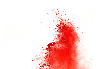 Red powder explosion on white background. Paint Holi.