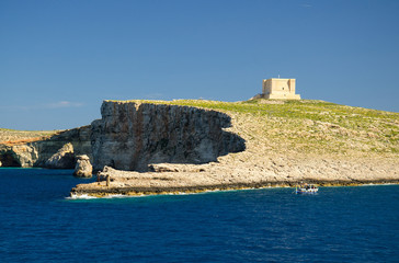 Fototapeta na wymiar Tower bastioned on island Comino in Mediterranean Sea, Malta