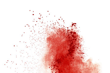 Red powder explosion on white background. Paint Holi.