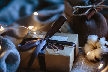 Cozy winter composition with eco gifts and christmas lights, flat lay, mock up, macro photo © cherry_d