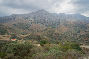 Fototapeta na wymiar Hania, Crete - 09 25 2018: Polirinia. Small mountain. Panoramic view on fields and mountains