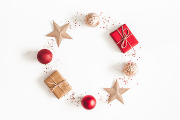 Christmas composition. Christmas gifts, red and golden decorations on white background. Flat lay,...