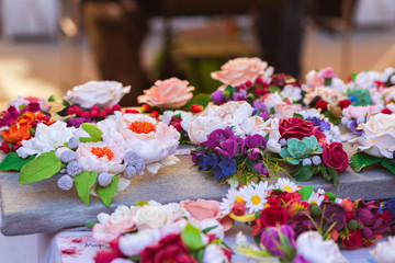 A large number of colorful artificial flowers