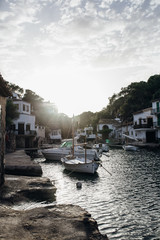 Sailboats and white houses in Spanish harbor 