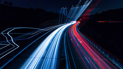 Fototapeta Highway car light trails at night obraz