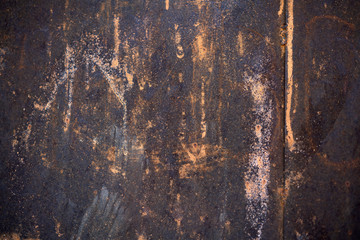 Rusty sheet of iron with a rough texture