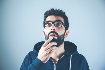 thinking man on gray background
