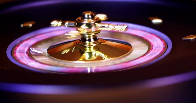 Casino roulette wheel in motion