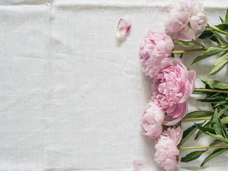 peony bouquet on white tablecloth