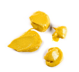 Fototapeta na wymiar Yellow mustard sauce, spread isolated on white background, top view