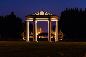 View at an illuminated gazebo in a a Central Park of Hillsboro
