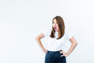 Portrait of angry pensive mad crazy stress beautiful young caucasian woman screaming out isolated on white background. Negative Human emotion, facial expression concept. Selective focus, Copy space.