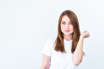 Close up portrait of Happy brunette caucasian smiling young woman looking at camera and posing isolated over white background. Body positive, self confidence, self love concept. Copy space.