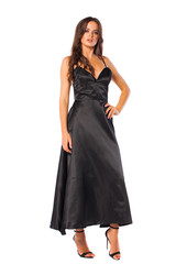 Fototapeta premium Full body, Young beautiful brunette woman in long black dress