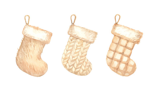 Vintage golden set of knitted and furry christmas stockings on white background. Christmas tree decorations.