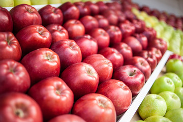 many red apples beautifully laid out on the market on the wind.Organic products.Farmers fruits.Selective focus