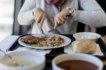woman eating at the restaurant
