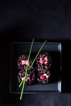 Plate With Black Rice Sushi