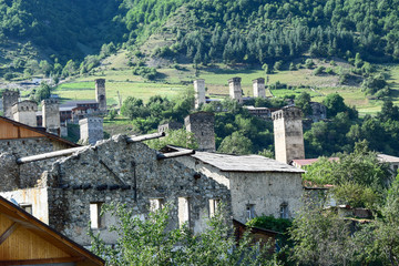 Fototapeta na wymiar Mestia is a highland town in Svaneti region in the Caucasus Mountains, Georgia, It is dominated by stone defensive towers (Svan towers).