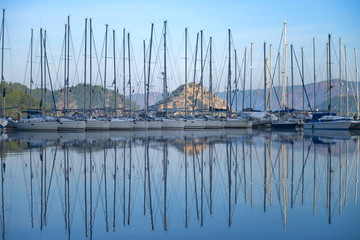 Marine sailing yachts in the port against the background of the morning sky. Marmaris.Turkey