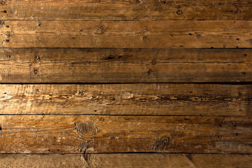 Naklejka na ściany i meble vintage aged dark brown wooden background texture close up
