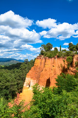 Ochre cliffs and rock formations near the village of Roussillon in the Luberon area of Provence, France
