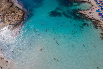 Aerial photo of a turquoise sandy beach