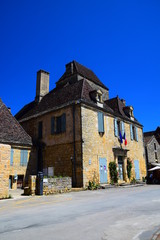 Fototapeta na wymiar Buildings along the streets of the bastide village of Domme in the Dordogne region of France